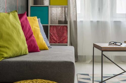 Grey sofa and small table in modern living room